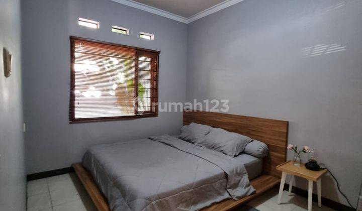 Rumah Super Bagus Full Furnished di Taman Kopo Indah 3 2