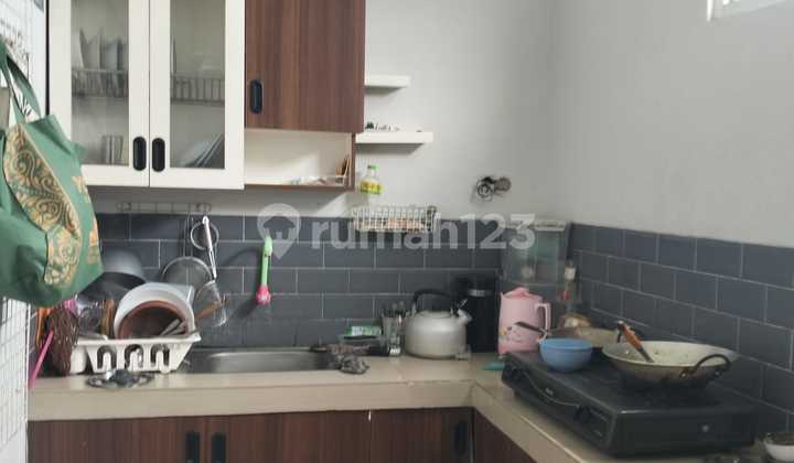 Quick Sale House Ready to OccupyStrategic Position Near Main Roadin Sariwangi 2