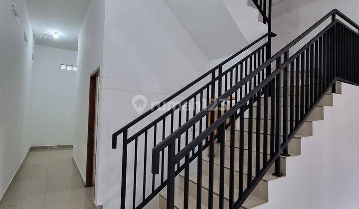 Rumah 2,5 lt taman palem lestari KT 4+1 km 3 siap huni rapi bagus 2