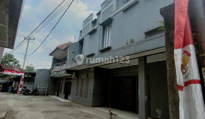 Rumah + Gudang Lokasi di Jl. Tengah, Sayap Tki 2