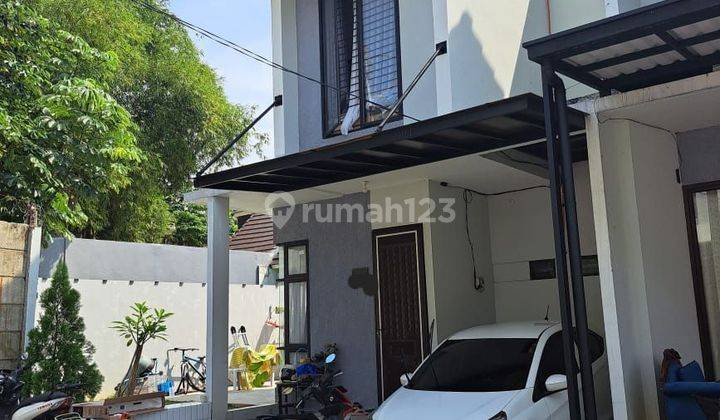 Rumah Baru dipojokan tanah 142meter + rooftop fekat MRT 2