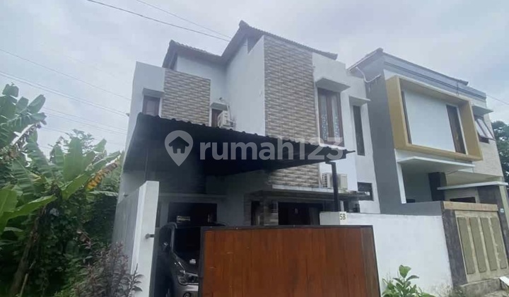 Minimalist 2-Story House in Front of Puspem Badung, Sempidi, Bali 2