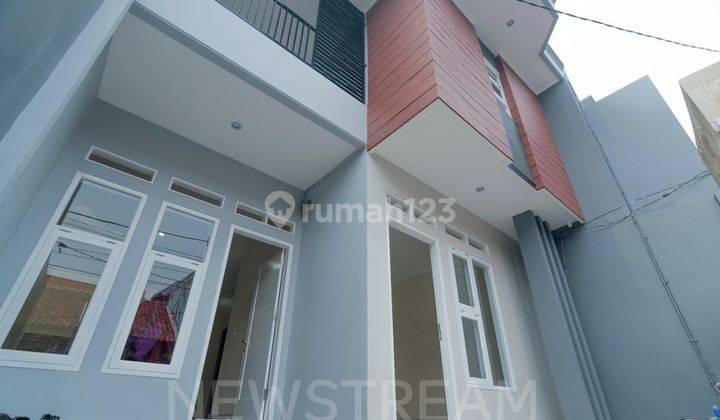 Dijual Rumah Kayu Putih, Bebas Banjir , Kinclong Terang Siap Huni 1