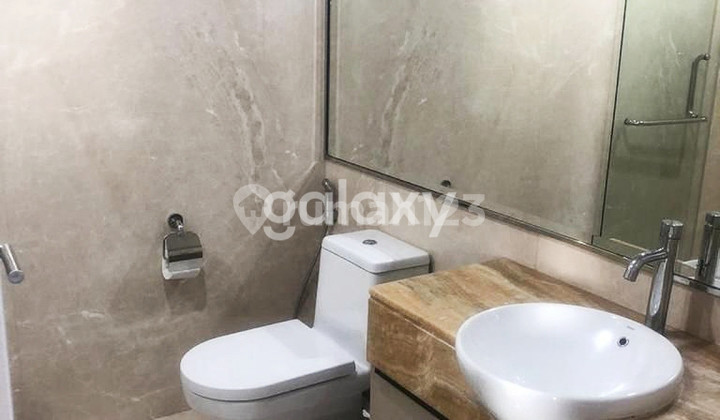 tampak depan sewa apartemen the peak residence