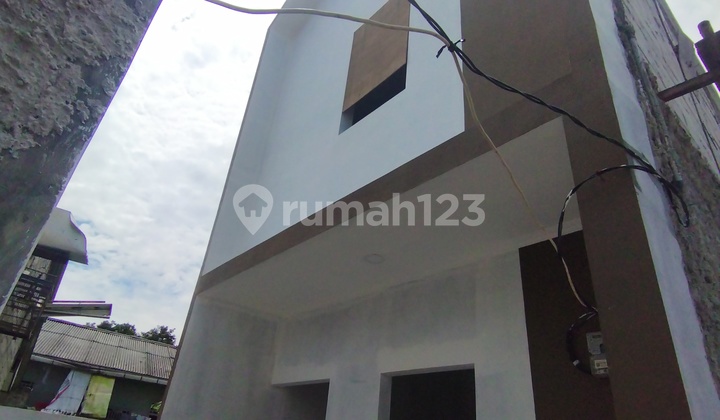 Ready-to-Live Two-Story House with Strategic Location, Affordable, Beautiful, Minimalist, Close to City Park in Cilangkap, East Jakarta Ready-to-Live Two-Story House with Strategic Location, Affordable, Beautiful, Minimalist, Close to City Park in Cilangkap, East Jakarta