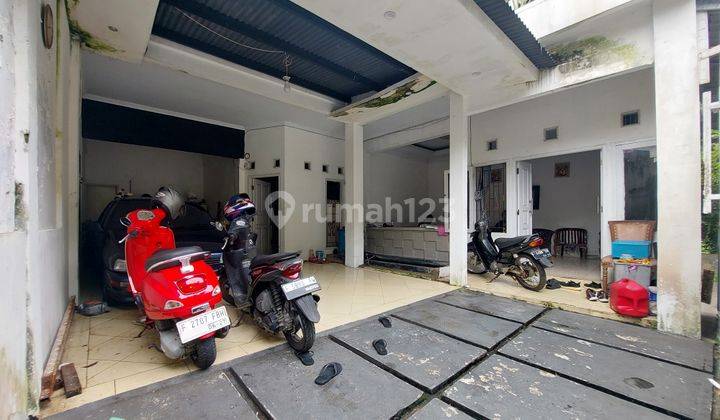 garasi/carport rumah hook sejuk 2 lantai