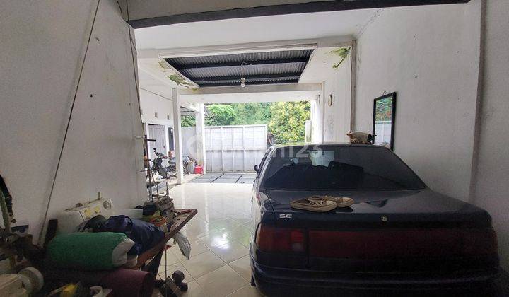 garasi/carport rumah hook sejuk 2 lantai