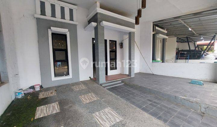 garasi/carport rumah murah 2 lantai graha