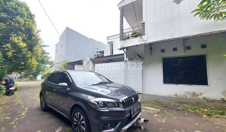 tampak depan rumah hook sejuk 2 lantai
