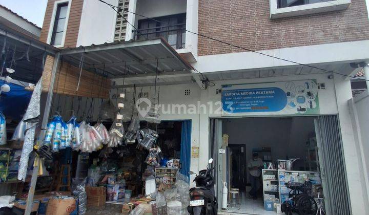 2 unit ruko 2 lantai plus bangunan rumah dilokasi strategis di Tugu Depok 2