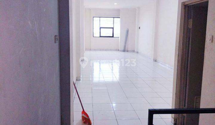 Ruko gandeng tepi.jl.raya 9
