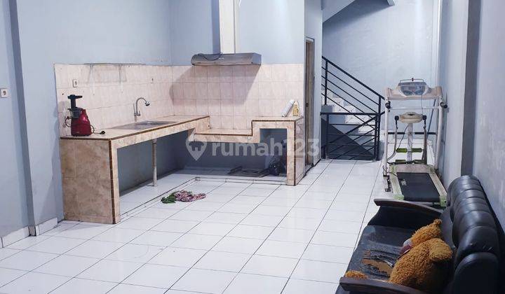 Ruko gandeng tepi.jl.raya 14