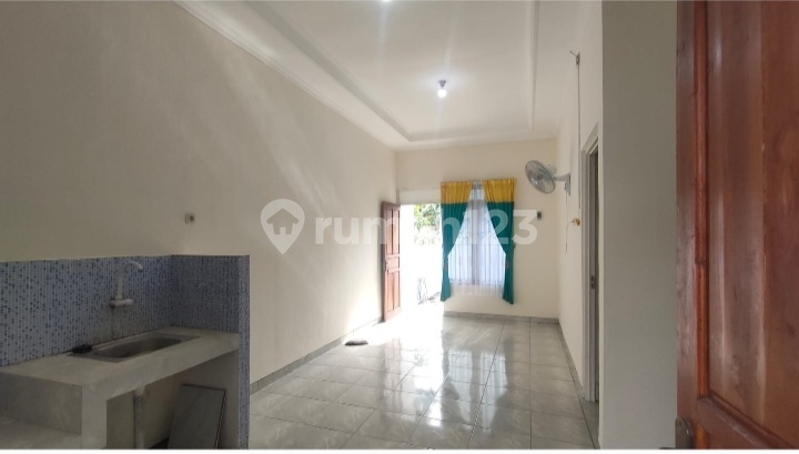 Rumah Bangunan Bagus Murah di Wolter Monginsidi 2