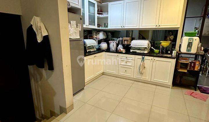 Rumah di Green Lake City East Asia 6x15 SHM Semi Furnish  3