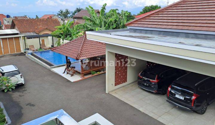 Rumah Mewah Kontemporer 2 Lantai Full Furnished + Kolam Renang 2