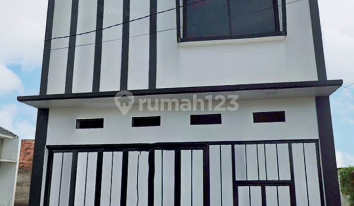 A 2-story Modern House in the Center of Cianjur City. A 2-story Modern House in the Center of Cianjur City.
