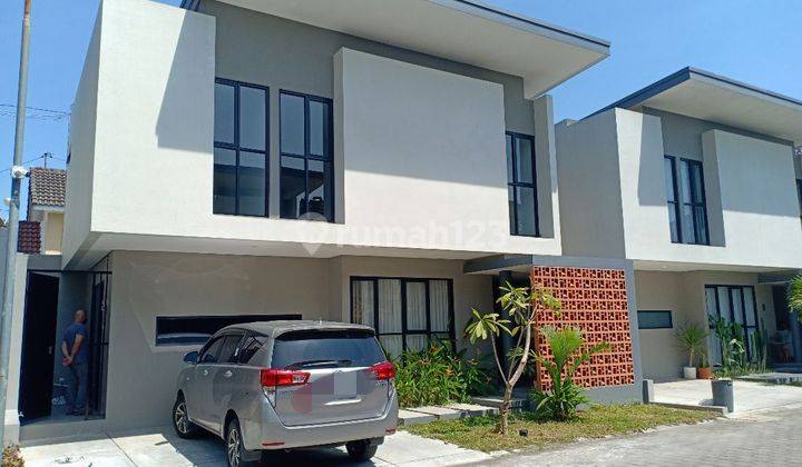 Rumah modern minimalis 2 lntai  1