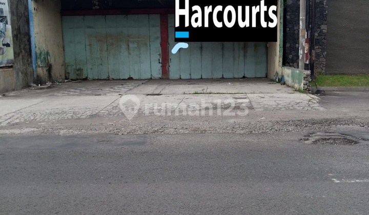 Warehouse and Residence Combined on the Side of a Main Highway