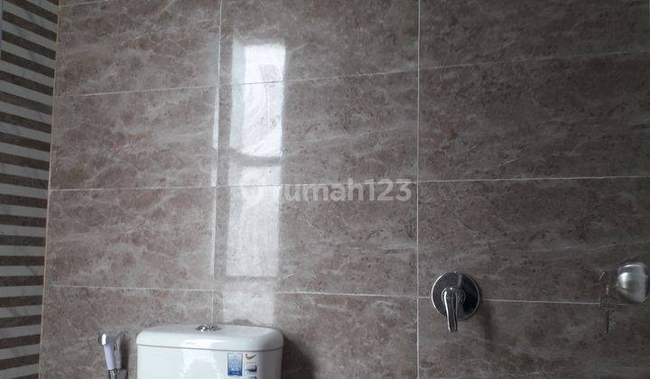 rumah cluster angsuran 2jutaan dekat stasiun 7