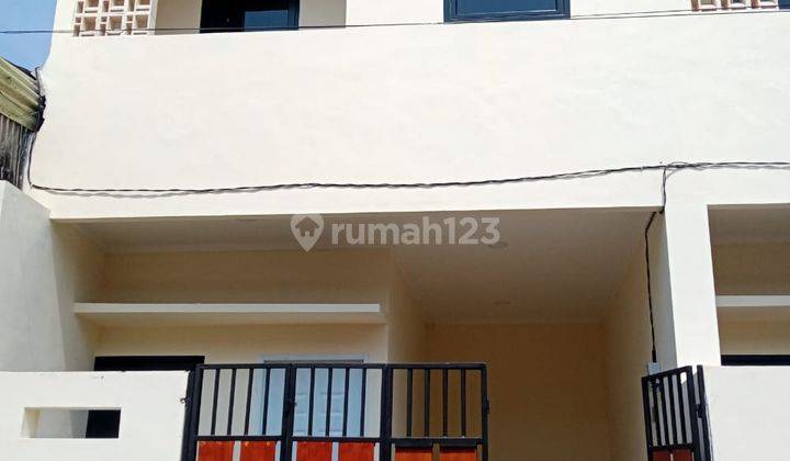 Rumah minimalis rapih siap huni di Kalideres, 0042 Crssus 1