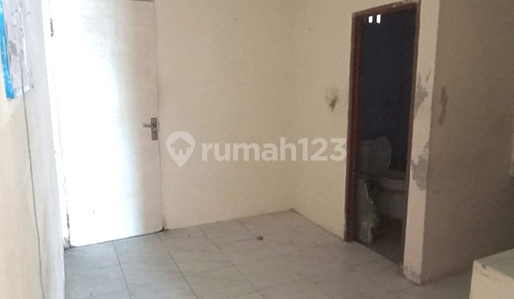 Rumah siap huni kondisi bagus di Puri Gardena, 0029 Mar 2