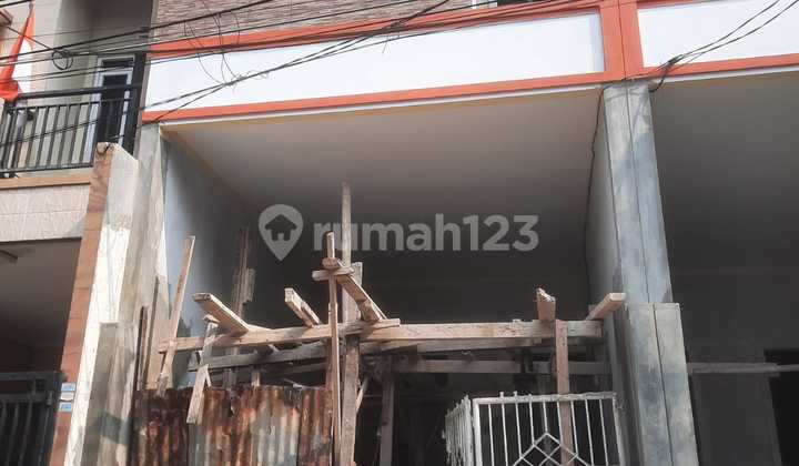 Rumah minimalis lokasi strategis di Tanjung Duren, 0001 Joe