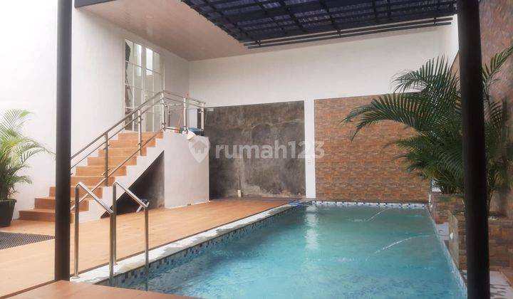 Rumah di Arcawinangun 2 Lantai bonus kolam renang dekat kampus Unsoed dan GOR Purwokerto 2