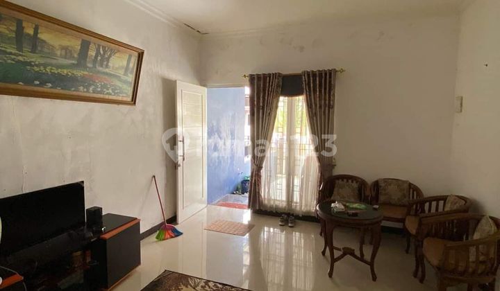 ruang keluarga rumah siap huni perum graha