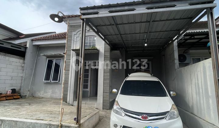 Modern Two-Story House in Griya Satria Bukit Permata Purwokerto Residential Complex