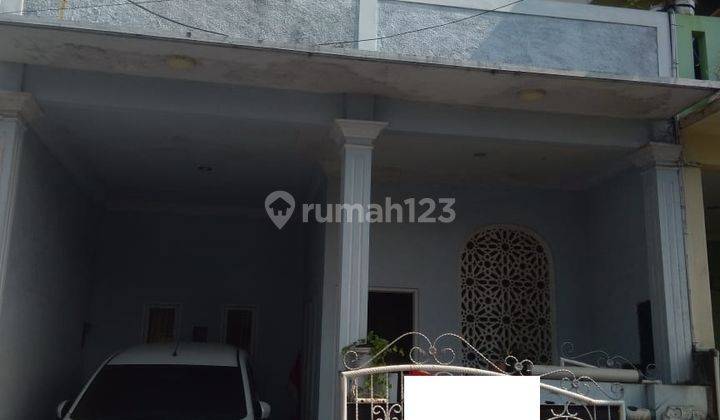 Rumah Minimalis Satu Setengah Lantai di Duta Bintaro Cluster Tampak Siring 1