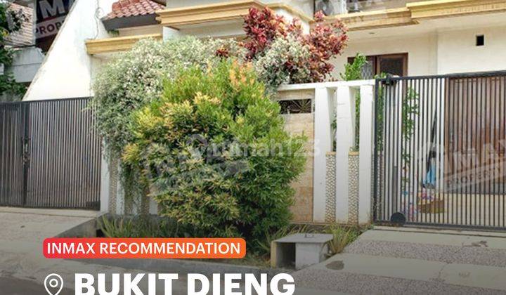 Rumah Murah Tanah Luas Siap Huni Di Bukit Dieng Malang Spesifikasi :luas Tanah : 300m²dimensi : 15 X 20luas Bangunan : 200m²kamar Tidur : 5kamar Mandi : 3pln : 2200 Wattair : Pdam + Sumur Bor Garasi : 1 Carport : 2hadap : Timur Shm Harga 2,6 Milyar Nego  1