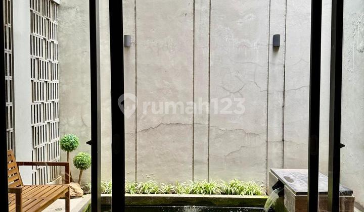 House with Outdoor Seating Area in Bintaro Tangsel Sc-16505