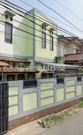 Ready-to-Live House with Comfortable and Green Living in a Strategic Location by the Roadside in Pondok Aren
