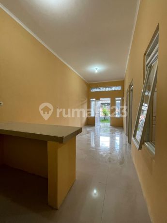 Rumah MURAH siap huni Bagus Unfurnished SHM di Graha Ranca Manyar