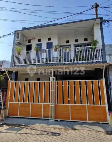 Affordable 2-story house in Sawojajar, 2 strategic locations, ready to occupy