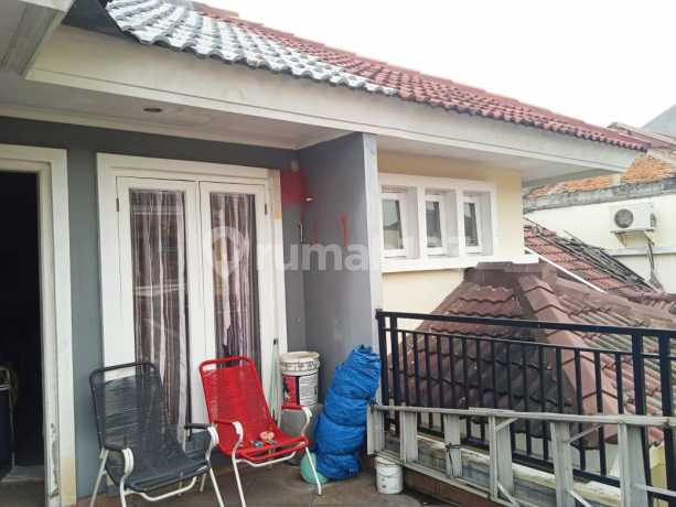 Rumah Cluster Puri Beta 1 Siap Huni dekat halteu busway