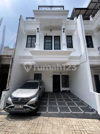 Rumah Mewah 3 Lantai Ada Rooftop Nya di Kavling Ui Barat Tanah Baru Beji Depok