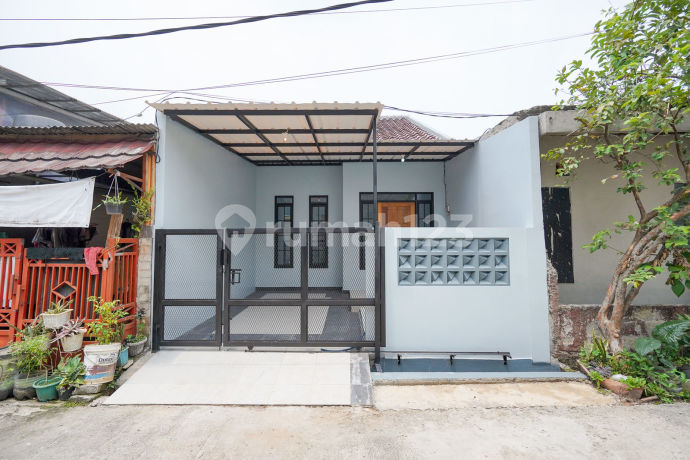 Rumah 16 Menit ke The Park Sawangan SHM Dibantu KPR J-37095 Rumah 16 Menit ke The Park Sawangan SHM Dibantu KPR J-37095