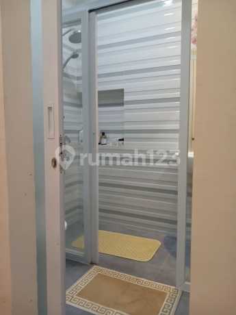 DIJUAL RUMAH 2 LANTAI UKURAN 4X15 DI GREEN LAKE CITY,PETIR,TANGERANG