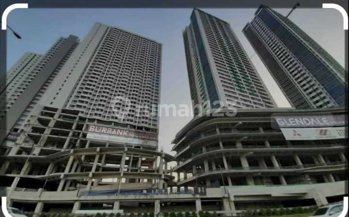 Dijual 2 BR Apartemen Orange County Tower Newsport Cikarang