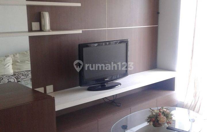 Apartment Cosmopolis Yang Asri di Tengah Kota Metropolis