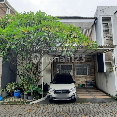 For Sale Minimalist House 2 Floors with Laundry Area and Drying Space, Clean Good Condition Ready to Occupy, Wide Road Row, Environment with One Gate System, Strategic Location Near Airport and Unidha Campus in Grand Devina Estate Cluster, Malang City H198