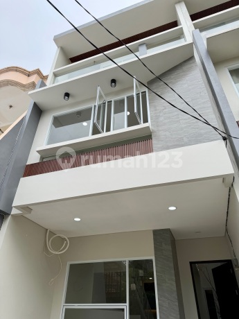 New House 4.5X15 Modern Tropical Strategic Flood-Free Duri Kepa Near Tanjung Duren West Jakarta