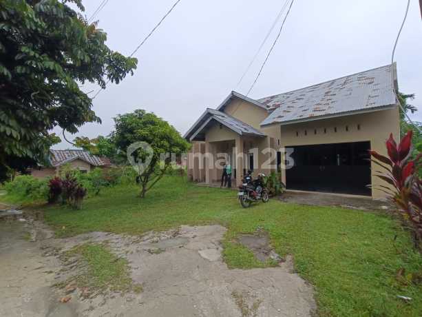 Rumah Siap Huni dan Tanah Luas Dijual di Jl. Daru-daru, Bukit Barisan