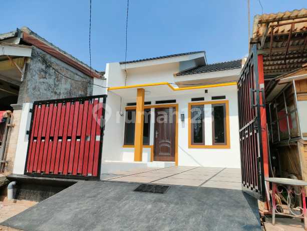 For Sale Cheap House One Gate in Bekasi Timur Regency Mustikajaya