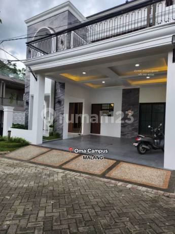 New House with American Style Concept in Oma Campus Area, Dau Malang New House with American Style Concept in Oma Campus Area, Dau Malang