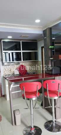 Spacious Apartment in the Golden Triangle of Bekasi City, Steps Away from LRT Station.