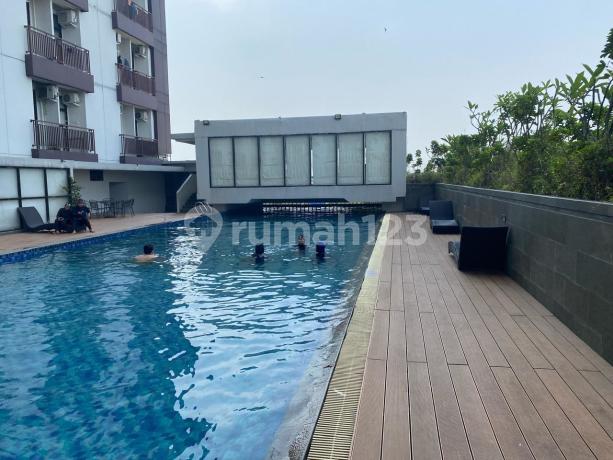 Dijual Dave Apartemen, Full Furnished Dengan View Kolam Renang Di Belakang Kampus Ui