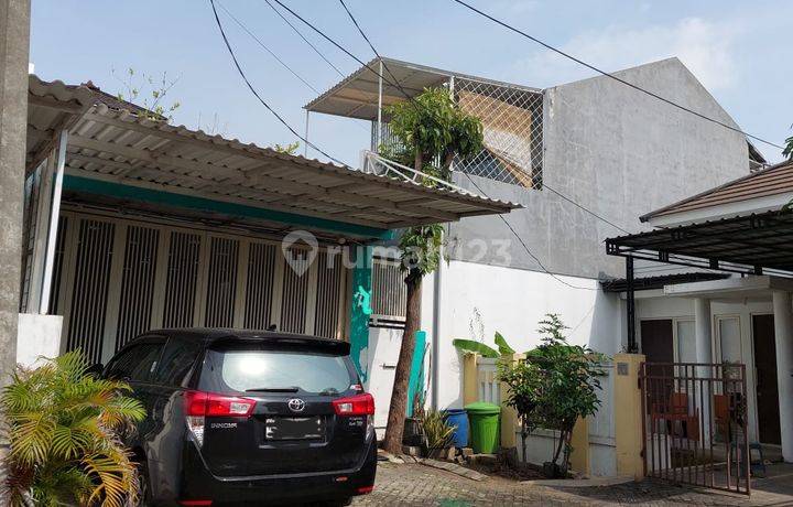 DIJUAL RUMAH GRAHA TIRTA CLUSTER BROMELIA SEMI FURNISHED