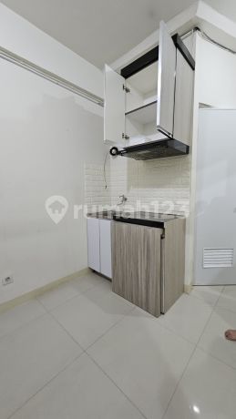 Apartemen Green Pramuka City 2 Kamar Tidur Semi Furnished Jual Cepat